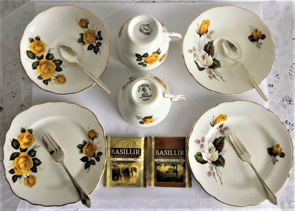 Royal Vale & Royal Sutherland Cup, Saucer & Side Plate with assorted teaspoons & cake forks
